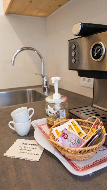 Macchina da caffè e dettaglio di benvenuto